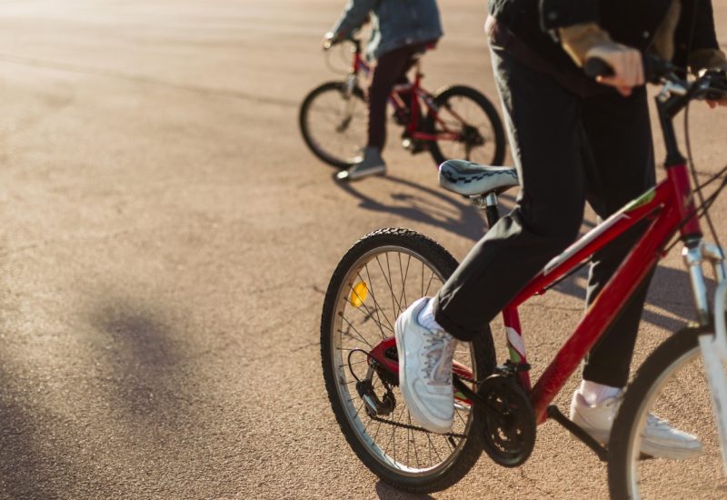 boys-riding-their-bikes-city