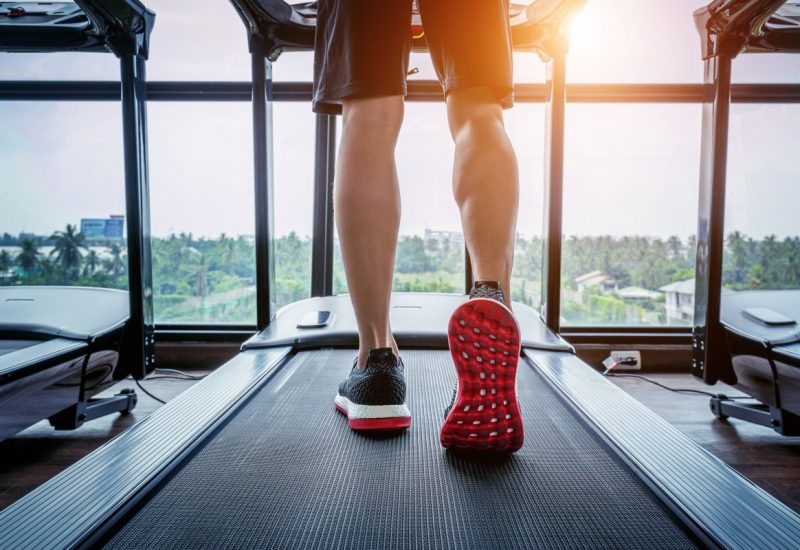 male-feet-sneakers-running-treadmill-gym-exercise-concept